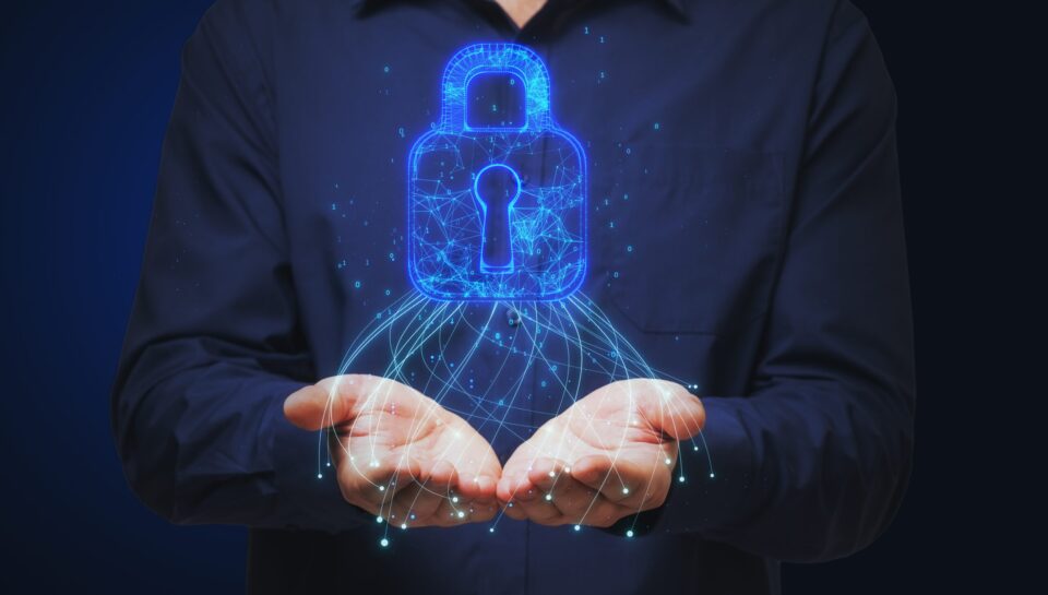 close-up-of-man-hands-holding-glowing-blue-padlock-2025-10-15-05-09-58-utc